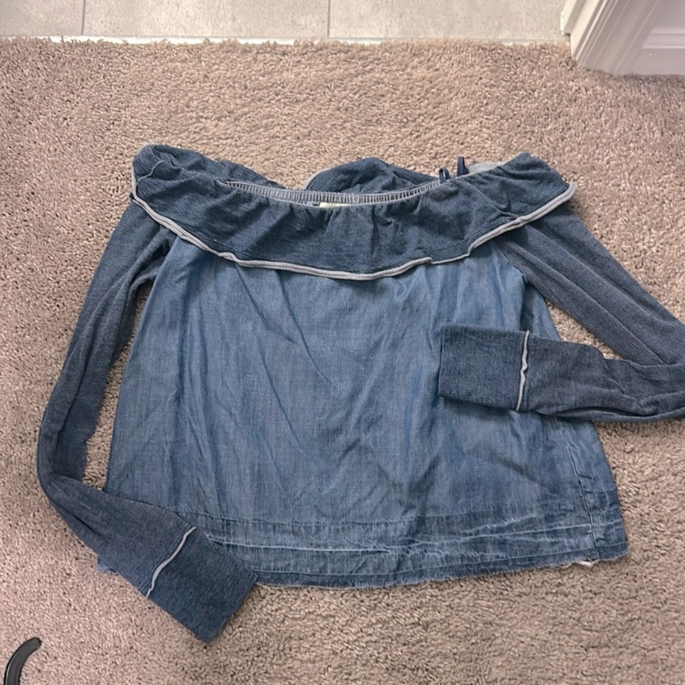 Off the shoulder denim blend shirt.